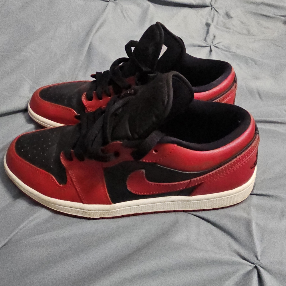 Red and Black Jordan 1 Low 'Reverse Bred' Sneakers
